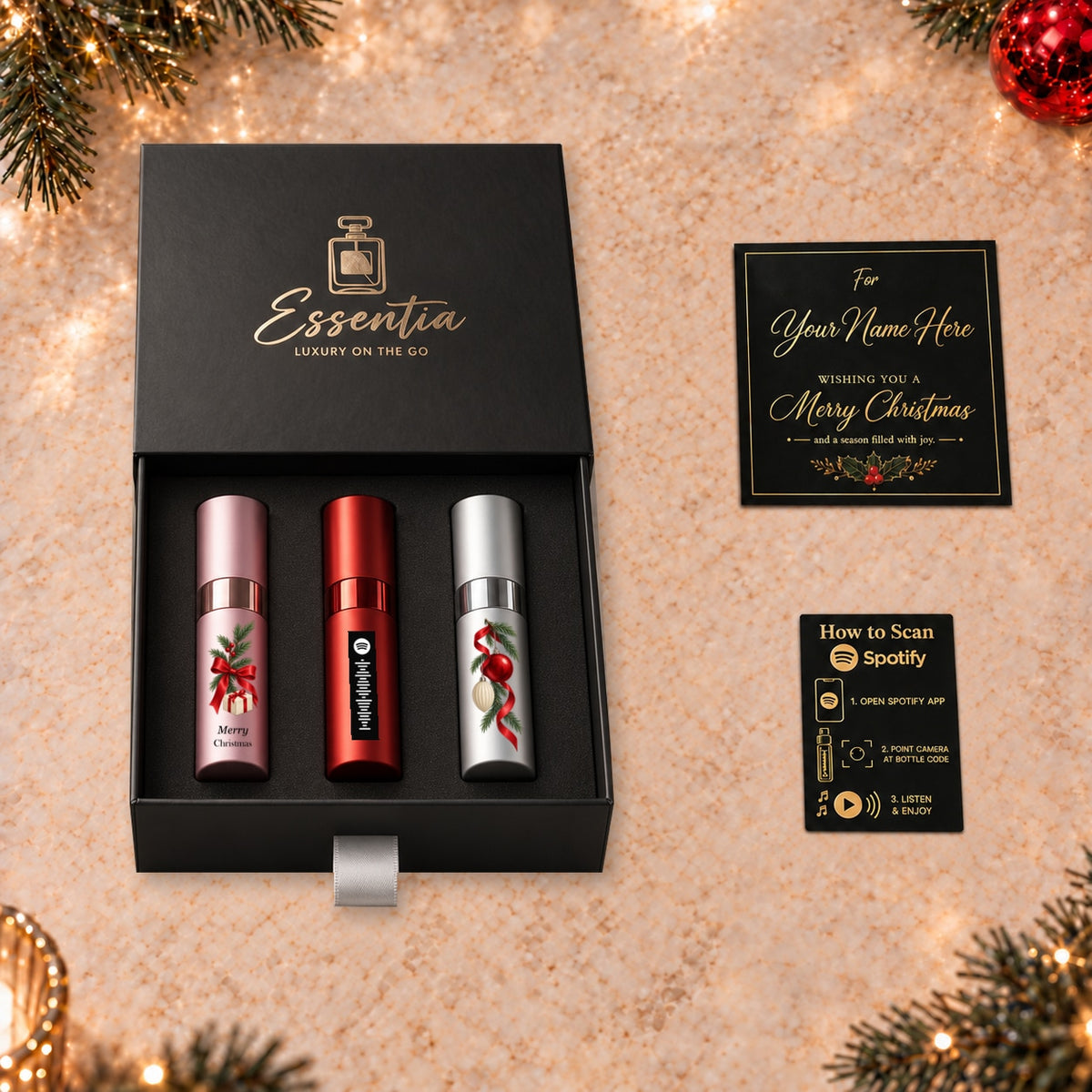 Christmas Fragrance Gift Set for Her — included contents. Pink, red and silver atomizers with Christmas artwork in the Essentia gift box.